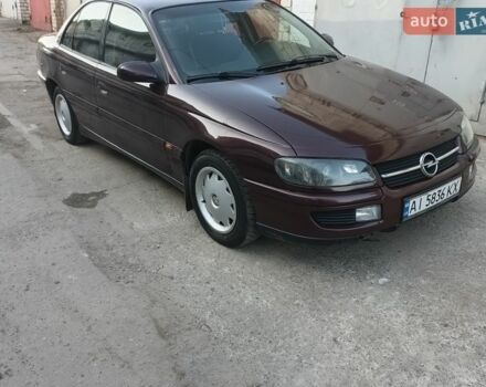 Фиолетовый Опель Омега, объемом двигателя 2.5 л и пробегом 274 тыс. км за 1499 $, фото 1 на Automoto.ua