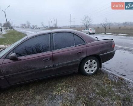 Фиолетовый Опель Омега, объемом двигателя 2.5 л и пробегом 314 тыс. км за 1000 $, фото 1 на Automoto.ua