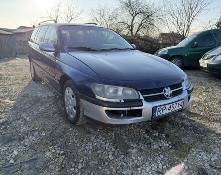 Фиолетовый Опель Омега, объемом двигателя 2.5 л и пробегом 222 тыс. км за 999 $, фото 1 на Automoto.ua