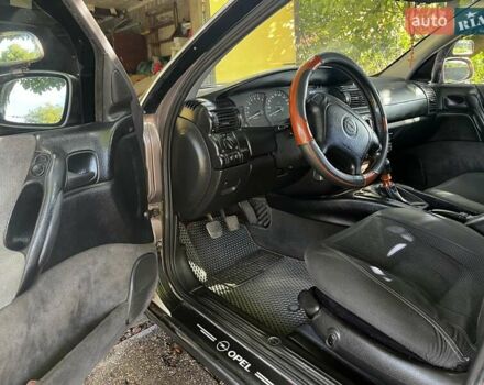 Коричневый Опель Омега, объемом двигателя 2 л и пробегом 351 тыс. км за 3000 $, фото 4 на Automoto.ua