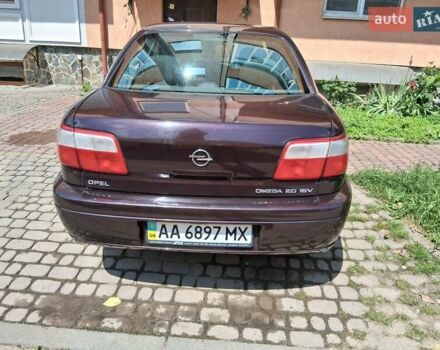 Коричневый Опель Омега, объемом двигателя 2 л и пробегом 106 тыс. км за 3500 $, фото 1 на Automoto.ua