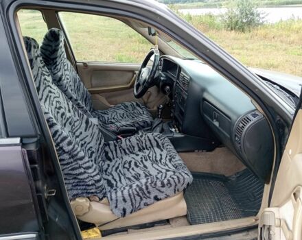 Коричневый Опель Омега, объемом двигателя 2 л и пробегом 280 тыс. км за 1000 $, фото 5 на Automoto.ua