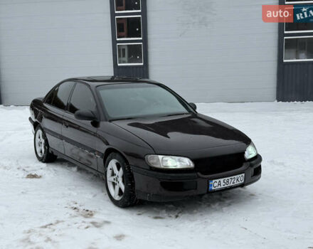 Коричневий Опель Омега, об'ємом двигуна 2 л та пробігом 180 тис. км за 1650 $, фото 1 на Automoto.ua