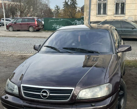 Коричневый Опель Омега, объемом двигателя 2.2 л и пробегом 362 тыс. км за 2400 $, фото 1 на Automoto.ua