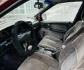 Червоний Опель Омега, об'ємом двигуна 2 л та пробігом 200 тис. км за 1150 $, фото 7 на Automoto.ua