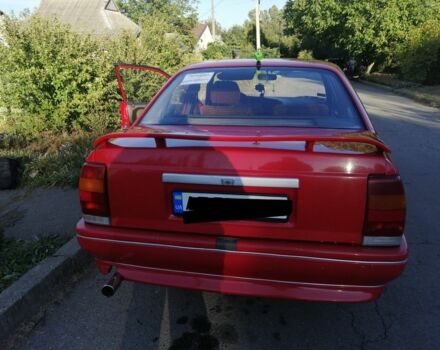 Красный Опель Омега, объемом двигателя 2 л и пробегом 200 тыс. км за 1200 $, фото 1 на Automoto.ua