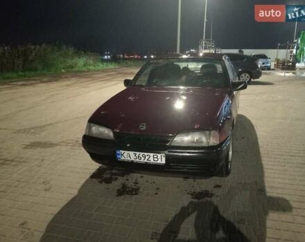 Червоний Опель Омега, об'ємом двигуна 2 л та пробігом 300 тис. км за 750 $, фото 4 на Automoto.ua