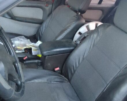 Красный Опель Омега, объемом двигателя 2 л и пробегом 300 тыс. км за 406 $, фото 6 на Automoto.ua