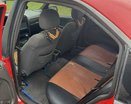 Красный Опель Омега, объемом двигателя 1.8 л и пробегом 300 тыс. км за 1500 $, фото 6 на Automoto.ua