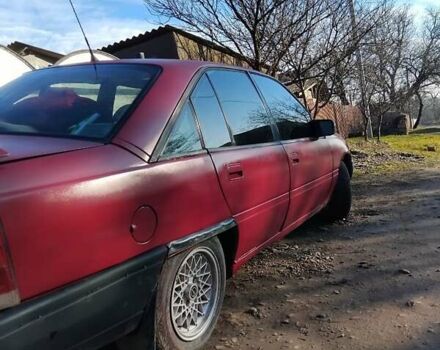 Красный Опель Омега, объемом двигателя 2 л и пробегом 400 тыс. км за 1400 $, фото 3 на Automoto.ua