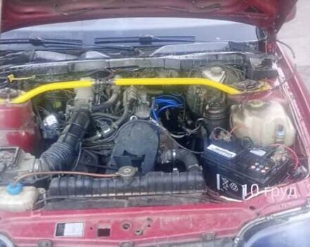 Червоний Опель Омега, об'ємом двигуна 2 л та пробігом 400 тис. км за 1200 $, фото 6 на Automoto.ua