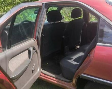 Красный Опель Омега, объемом двигателя 1.8 л и пробегом 206 тыс. км за 1700 $, фото 3 на Automoto.ua
