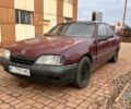 Червоний Опель Омега, об'ємом двигуна 2 л та пробігом 300 тис. км за 559 $, фото 1 на Automoto.ua
