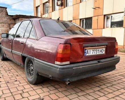 Красный Опель Омега, объемом двигателя 2 л и пробегом 300 тыс. км за 583 $, фото 2 на Automoto.ua