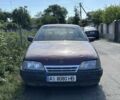 Красный Опель Омега, объемом двигателя 2 л и пробегом 200 тыс. км за 560 $, фото 1 на Automoto.ua