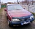 Красный Опель Омега, объемом двигателя 2.4 л и пробегом 140 тыс. км за 1700 $, фото 1 на Automoto.ua