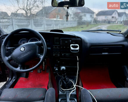 Красный Опель Омега, объемом двигателя 2 л и пробегом 350 тыс. км за 1099 $, фото 8 на Automoto.ua