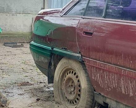 Красный Опель Омега, объемом двигателя 2 л и пробегом 300 тыс. км за 600 $, фото 5 на Automoto.ua