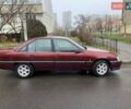 Червоний Опель Омега, об'ємом двигуна 2 л та пробігом 250 тис. км за 2000 $, фото 1 на Automoto.ua
