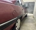 Червоний Опель Омега, об'ємом двигуна 2 л та пробігом 450 тис. км за 1000 $, фото 1 на Automoto.ua