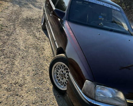 Красный Опель Омега, объемом двигателя 2.6 л и пробегом 200 тыс. км за 2300 $, фото 2 на Automoto.ua