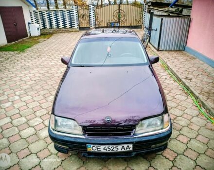 Червоний Опель Омега, об'ємом двигуна 2 л та пробігом 273 тис. км за 1500 $, фото 2 на Automoto.ua