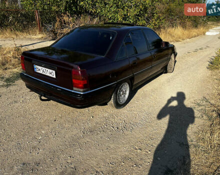 Красный Опель Омега, объемом двигателя 2.6 л и пробегом 200 тыс. км за 2300 $, фото 4 на Automoto.ua