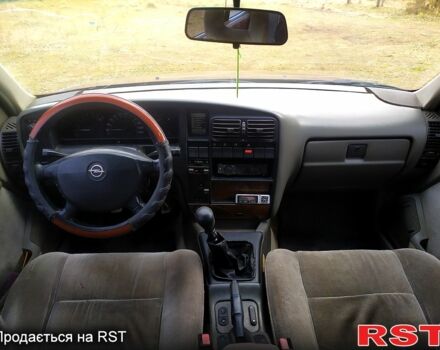 Красный Опель Омега, объемом двигателя 2 л и пробегом 0 тыс. км за 1700 $, фото 10 на Automoto.ua