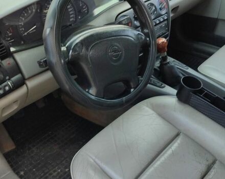 Червоний Опель Омега, об'ємом двигуна 3 л та пробігом 294 тис. км за 2400 $, фото 7 на Automoto.ua