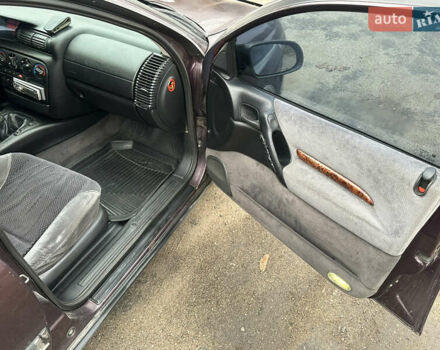 Красный Опель Омега, объемом двигателя 2.5 л и пробегом 390 тыс. км за 1800 $, фото 18 на Automoto.ua