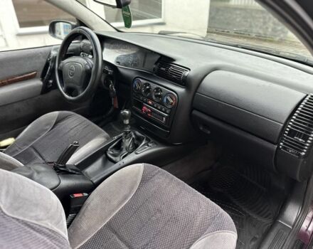 Червоний Опель Омега, об'ємом двигуна 2 л та пробігом 301 тис. км за 2200 $, фото 10 на Automoto.ua