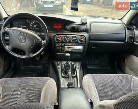 Красный Опель Омега, объемом двигателя 2.5 л и пробегом 390 тыс. км за 1800 $, фото 14 на Automoto.ua