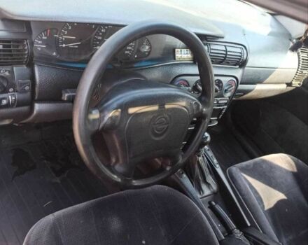 Червоний Опель Омега, об'ємом двигуна 2 л та пробігом 534 тис. км за 1200 $, фото 4 на Automoto.ua