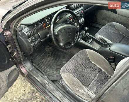 Красный Опель Омега, объемом двигателя 2.5 л и пробегом 390 тыс. км за 1800 $, фото 11 на Automoto.ua