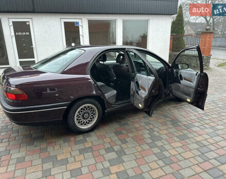 Красный Опель Омега, объемом двигателя 2 л и пробегом 301 тыс. км за 2200 $, фото 3 на Automoto.ua