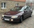 Червоний Опель Омега, об'ємом двигуна 2 л та пробігом 301 тис. км за 2200 $, фото 5 на Automoto.ua