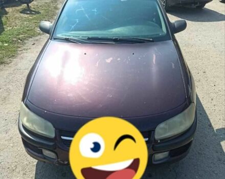 Червоний Опель Омега, об'ємом двигуна 2 л та пробігом 534 тис. км за 1200 $, фото 2 на Automoto.ua