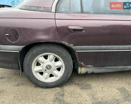 Красный Опель Омега, объемом двигателя 2.5 л и пробегом 390 тыс. км за 1800 $, фото 4 на Automoto.ua