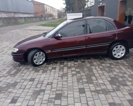 Червоний Опель Омега, об'ємом двигуна 2 л та пробігом 65 тис. км за 1550 $, фото 15 на Automoto.ua