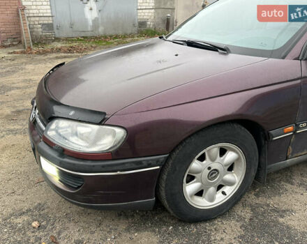 Красный Опель Омега, объемом двигателя 2.5 л и пробегом 390 тыс. км за 1800 $, фото 7 на Automoto.ua