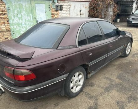 Красный Опель Омега, объемом двигателя 2.5 л и пробегом 390 тыс. км за 1800 $, фото 3 на Automoto.ua