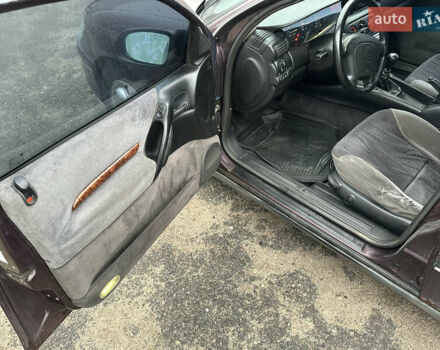 Красный Опель Омега, объемом двигателя 2.5 л и пробегом 390 тыс. км за 1800 $, фото 10 на Automoto.ua