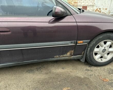 Красный Опель Омега, объемом двигателя 2.5 л и пробегом 390 тыс. км за 1800 $, фото 5 на Automoto.ua