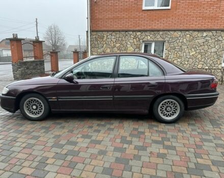 Червоний Опель Омега, об'ємом двигуна 2 л та пробігом 301 тис. км за 2200 $, фото 6 на Automoto.ua