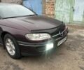 Красный Опель Омега, объемом двигателя 2.5 л и пробегом 390 тыс. км за 1800 $, фото 6 на Automoto.ua