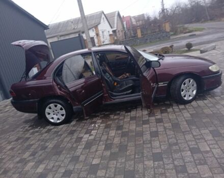 Червоний Опель Омега, об'ємом двигуна 2 л та пробігом 65 тис. км за 1550 $, фото 17 на Automoto.ua