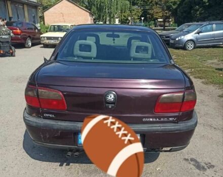 Червоний Опель Омега, об'ємом двигуна 2 л та пробігом 534 тис. км за 1200 $, фото 3 на Automoto.ua