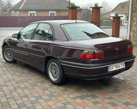 Червоний Опель Омега, об'ємом двигуна 2 л та пробігом 301 тис. км за 2200 $, фото 1 на Automoto.ua