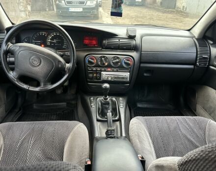 Красный Опель Омега, объемом двигателя 2.5 л и пробегом 390 тыс. км за 1800 $, фото 14 на Automoto.ua