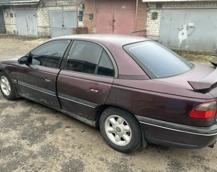 Красный Опель Омега, объемом двигателя 2.5 л и пробегом 390 тыс. км за 1800 $, фото 2 на Automoto.ua